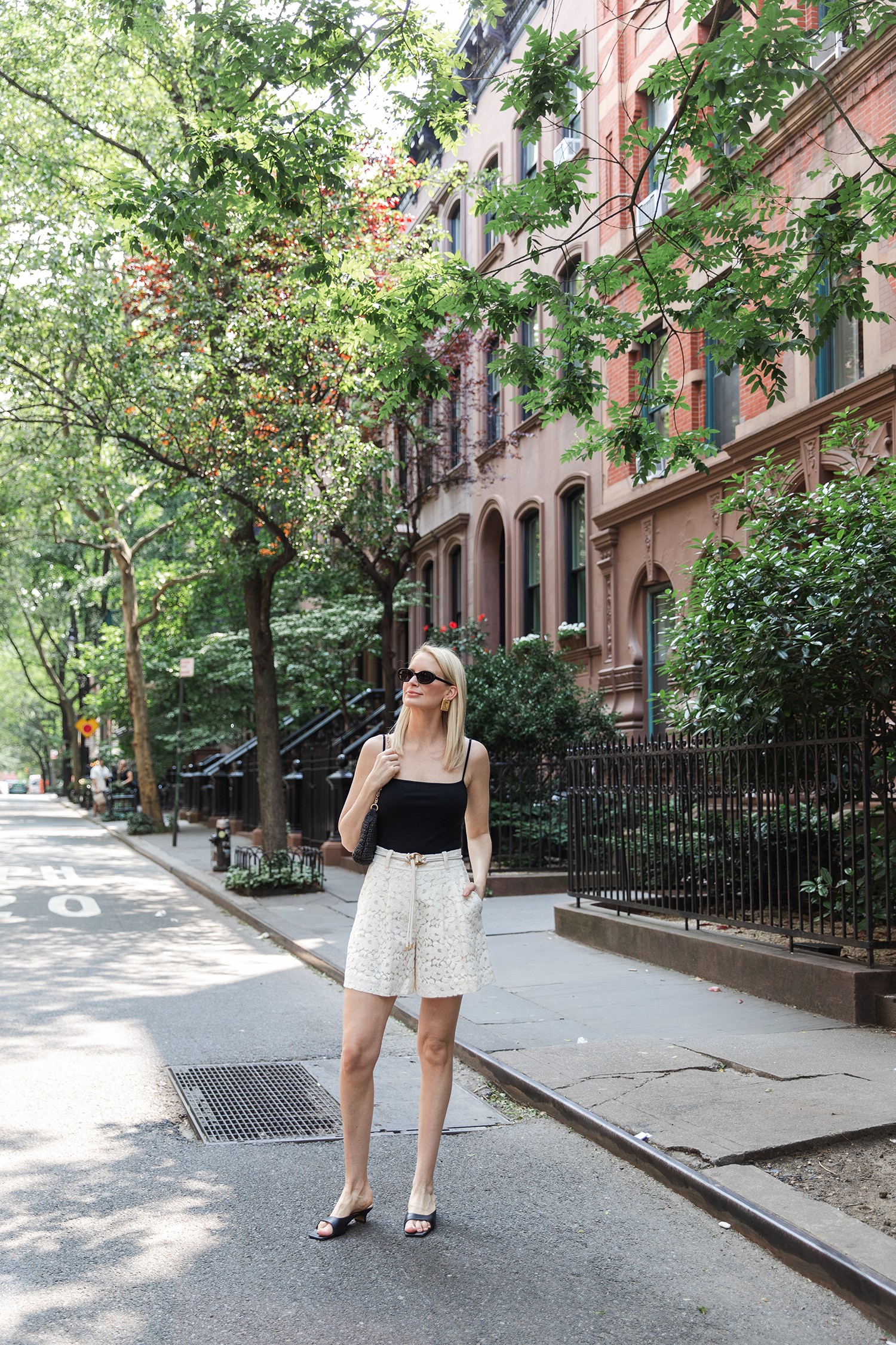 MERRITT BECK WEARING ZIMMERMANN ILLUMINATE LACE SHORTS
