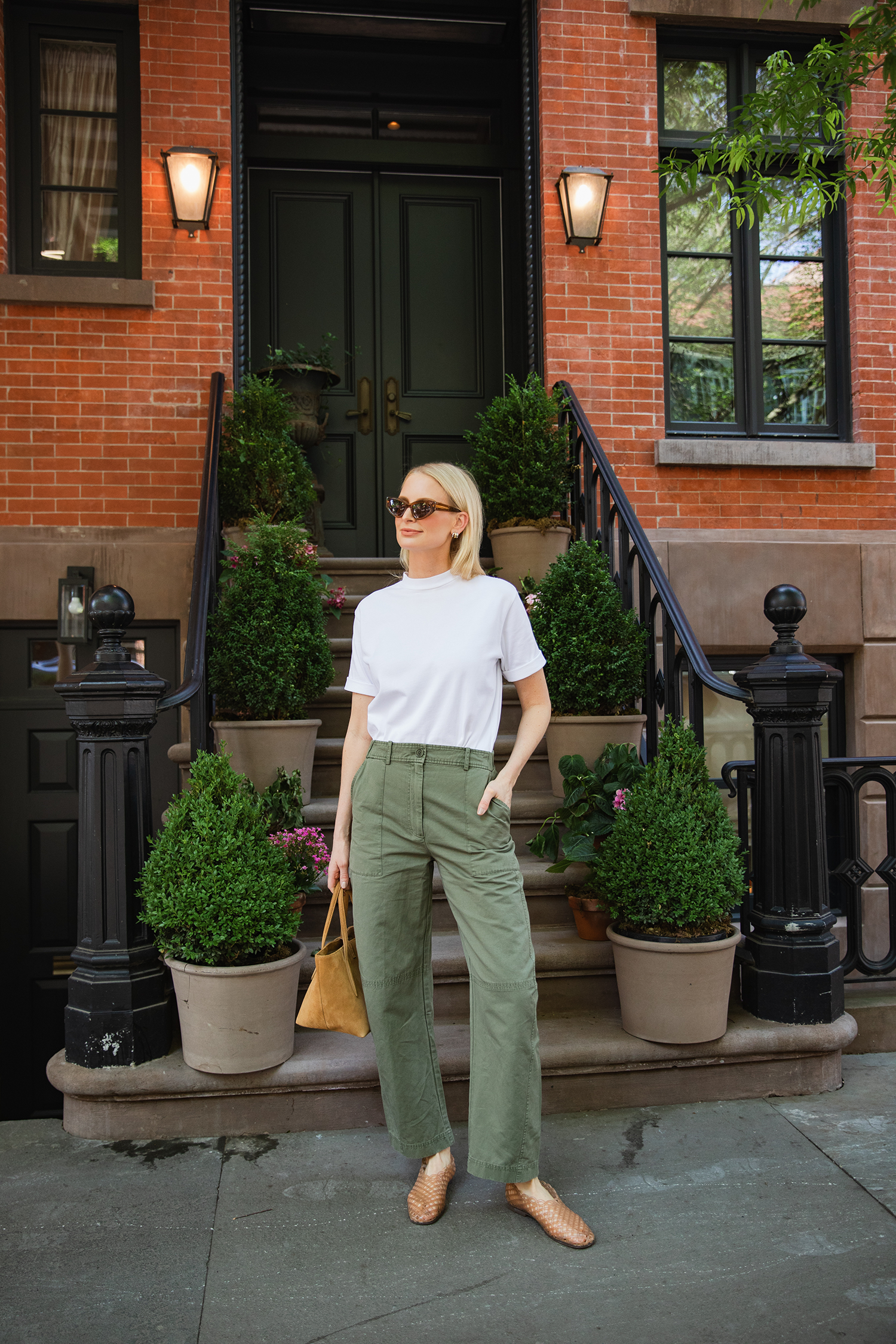 MERRITT BECK WEARING A TIBI MOCK NECK T-SHIRT AND APIECE APART MARINA PANTS - EASY TRANSITIONAL BASICS