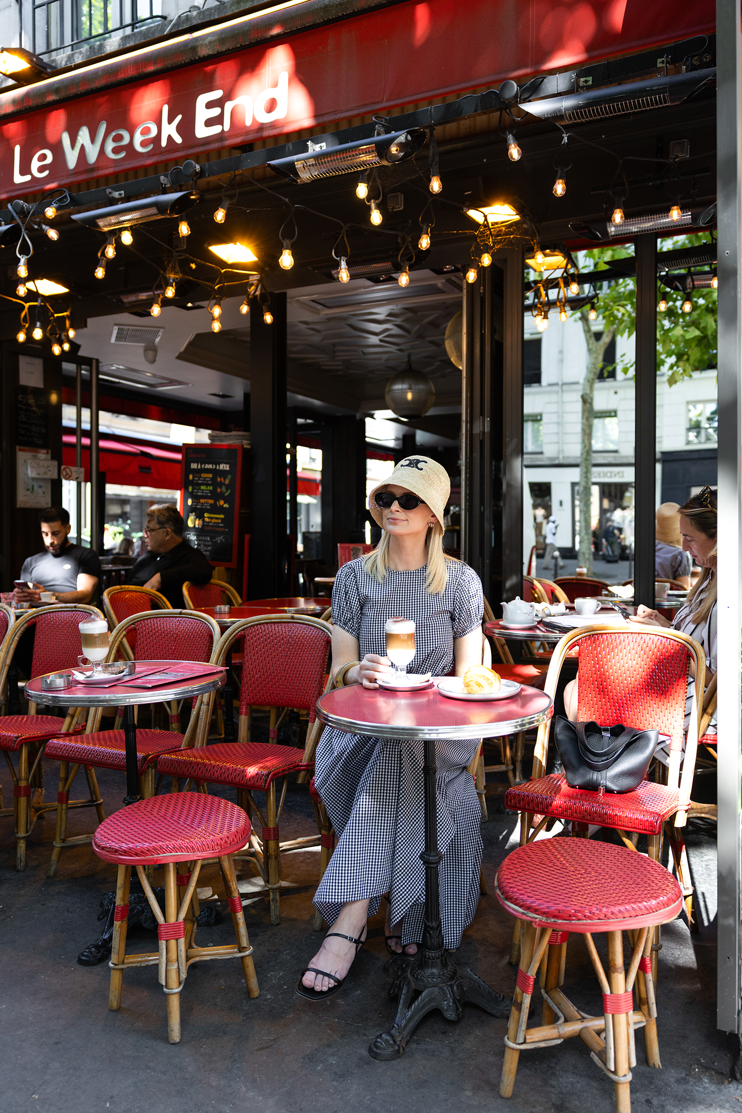 Passport to Paris // Merritt Beck in a Celine Raffia Bucket Hat and Playa Lucille Gingham Crop top and Maxi skirt