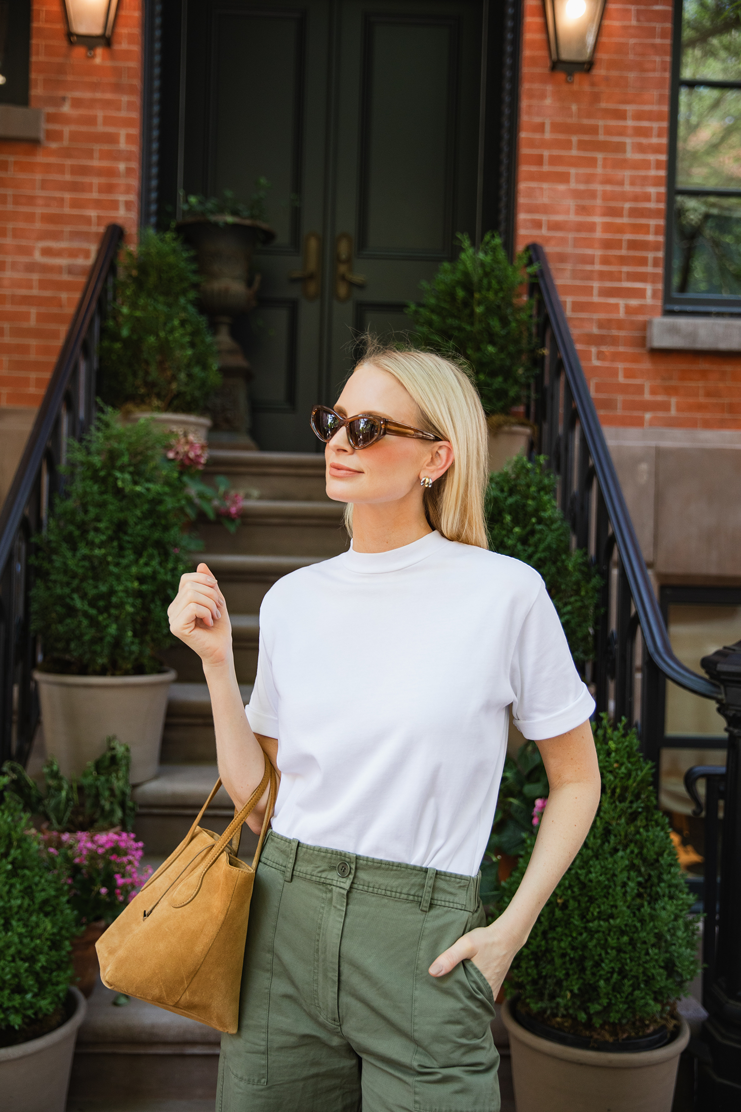 MERRITT BECK WEARING A TIBI MOCK NECK T-SHIRT AND APIECE APART MARINA PANTS - EASY TRANSITIONAL BASICS