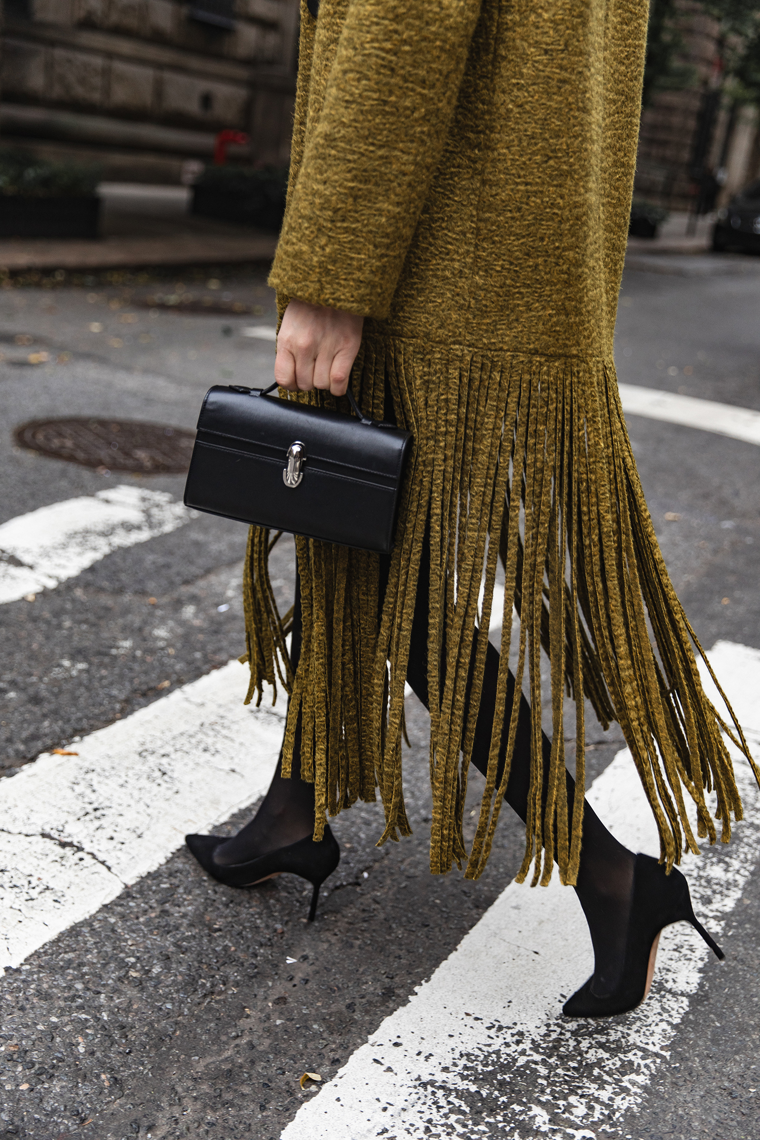 MERRITT BECK IN A SIMON MILLER VERO FRINGE COAT