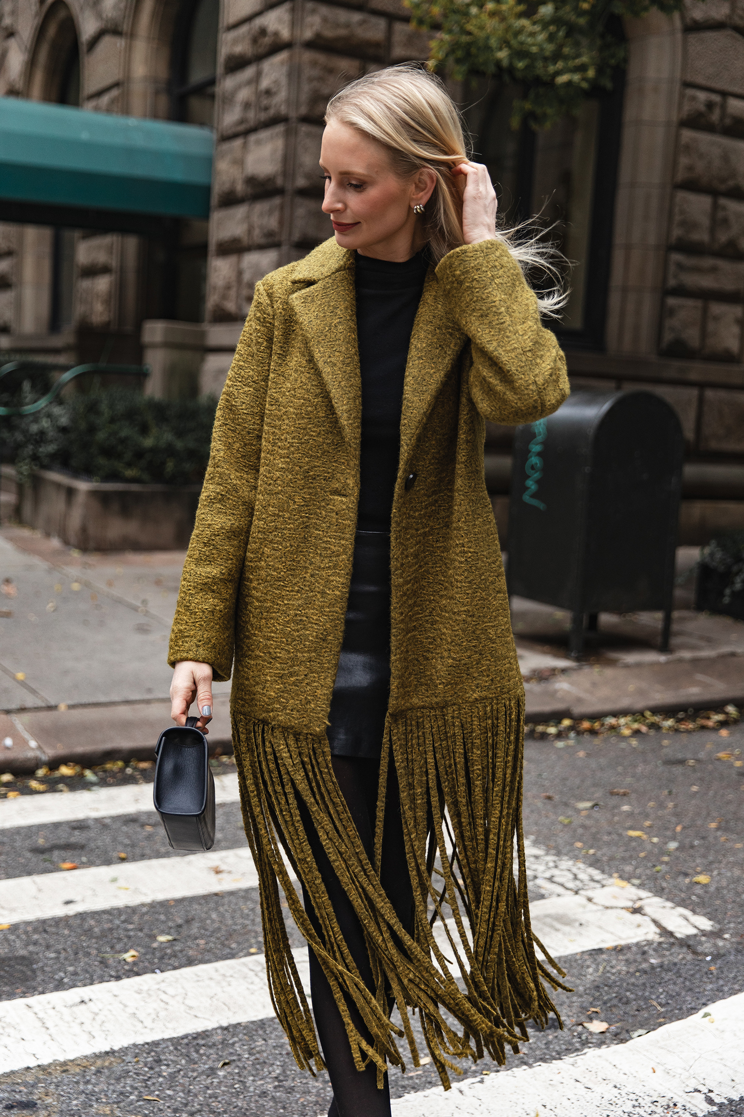 MERRITT BECK IN A SIMON MILLER VERO FRINGE COAT