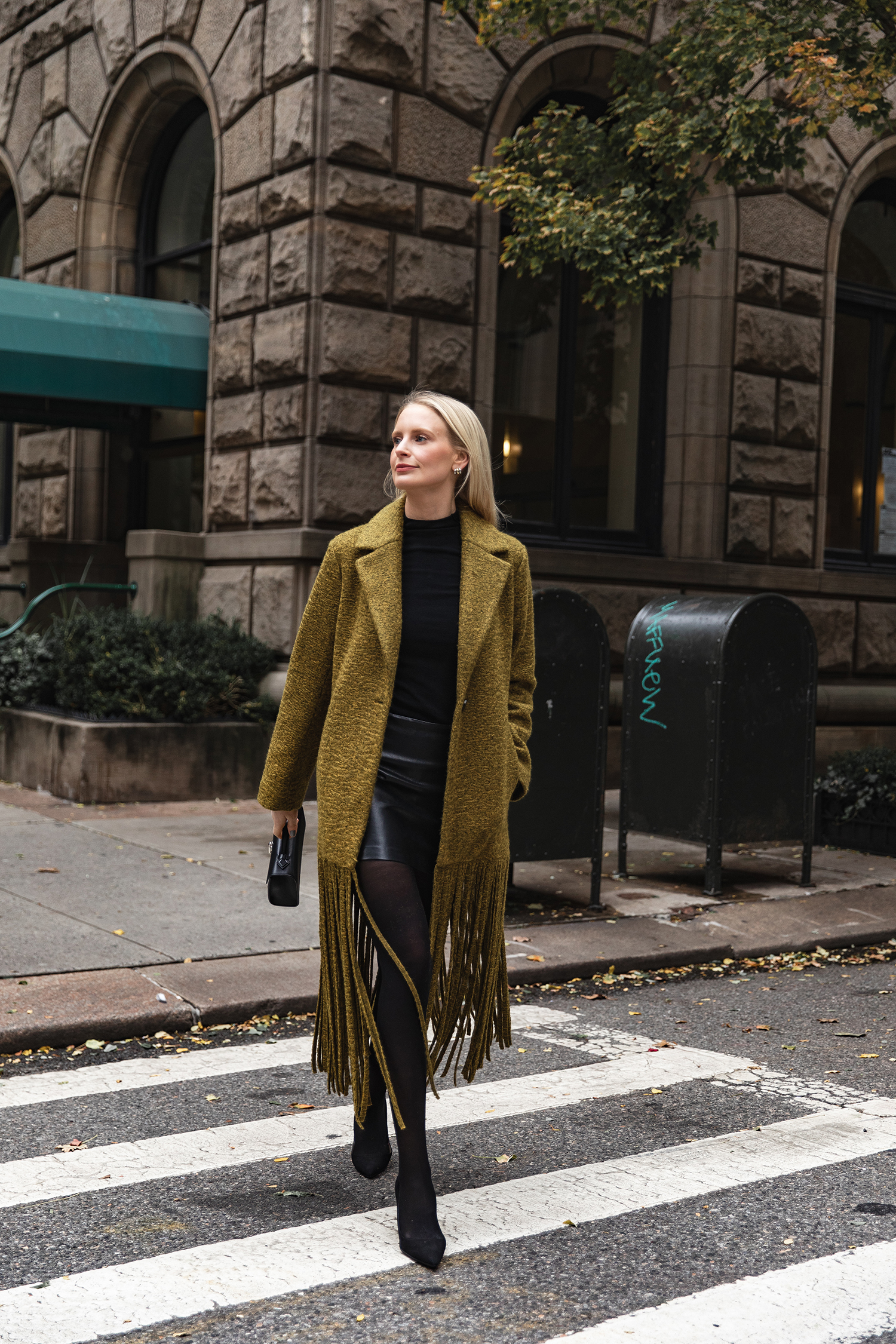 MERRITT BECK IN A SIMON MILLER VERO FRINGE COAT