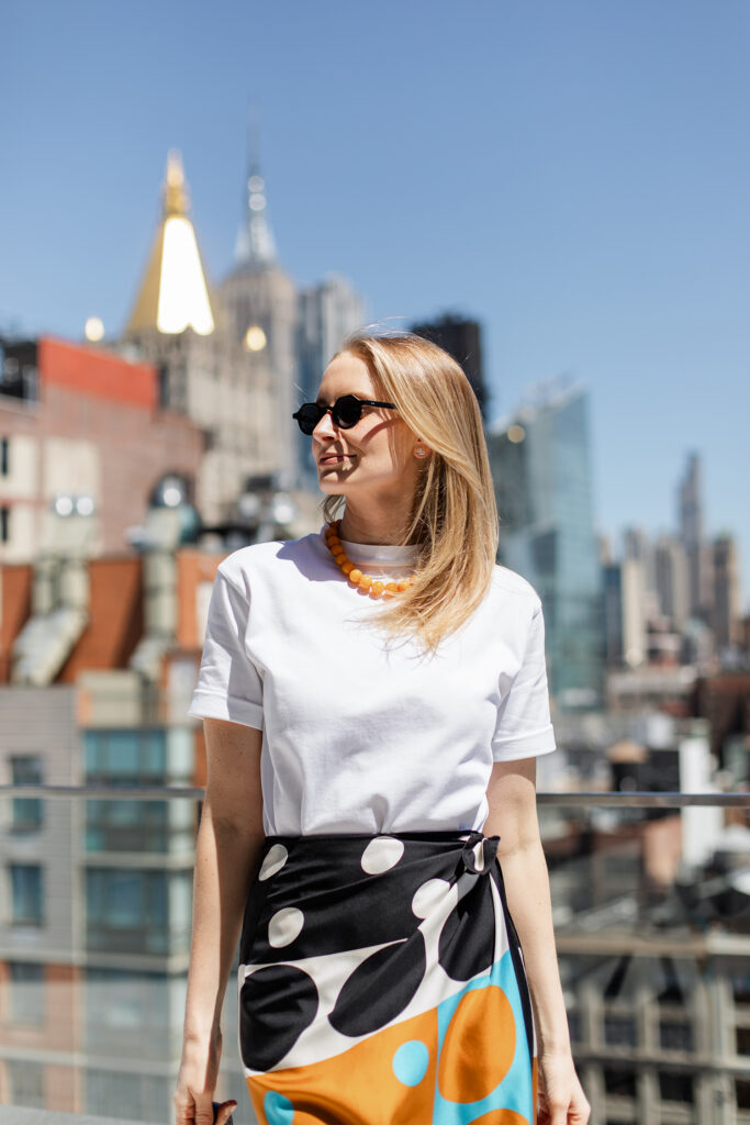MERRITT BECK IN A DRIES VAN NOTEN SILK PAREO SKIRT ON A ROOFTOP IN GRAMERCY