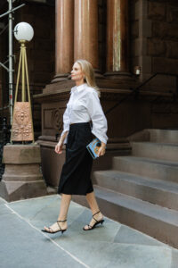 Merritt Beck wearing a Hevron Cropped Shirt and Beaufille Culottes