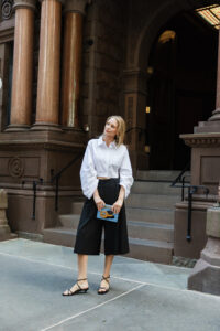 Merritt Beck wearing a Hevron Cropped Shirt and Beaufille Culottes
