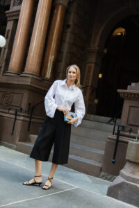 Merritt Beck wearing a Hevron Cropped Shirt and Beaufille Culottes